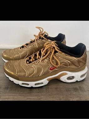 Nike Metallic Gold Trainers with Red Swoosh